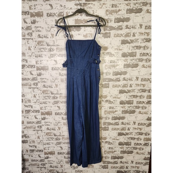 Free People Pants - Free People Denim Jumpsuit Size 10 Blue Wide Leg Tie Strap Smocked Boho Festival